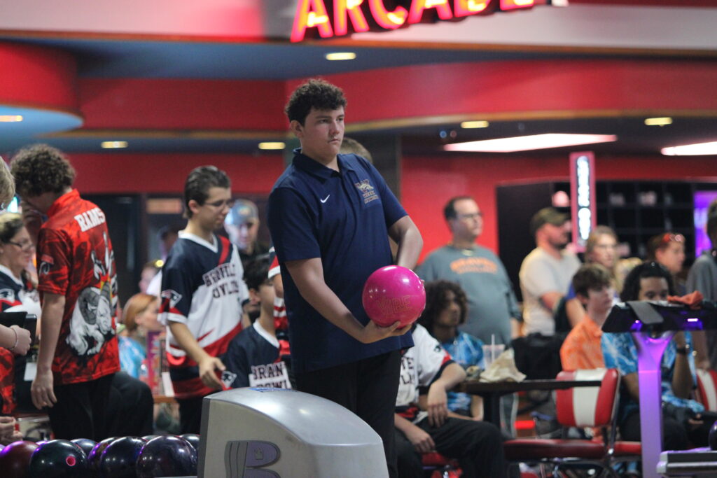 William Warren prepared to bowl