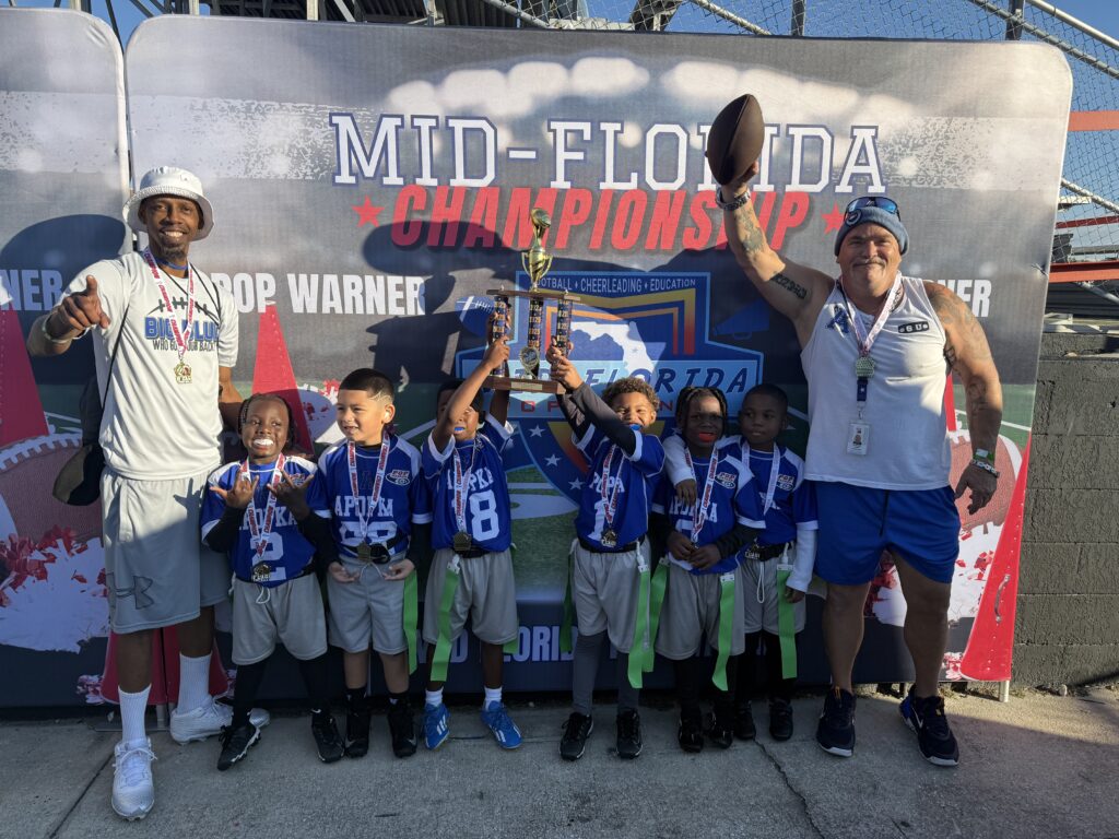 6U Blue Darters flag. (L-R, Kyle Howard Jr, Noah Pimental, Reginald Smith Jr., Blaise Wood, Amoi Chandler, and Raheem Smith. Jessiah Lowery also on the team)