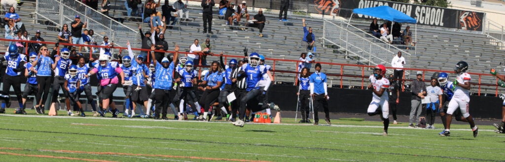 Cayden Dixon finds open space for a punt return to the house