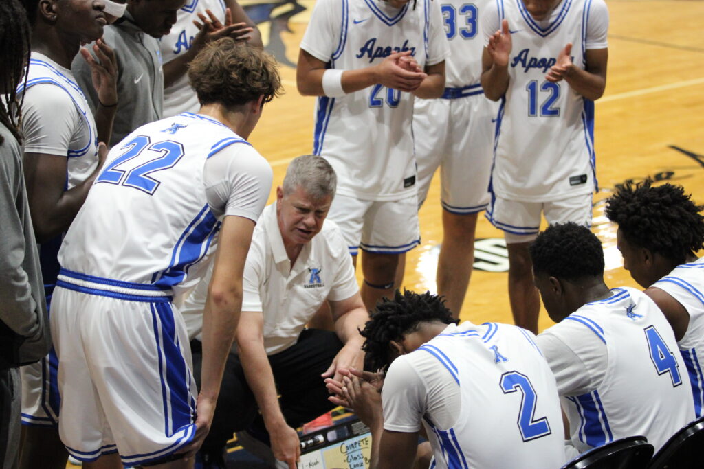 Coach Scott Williams in the pregame huddle