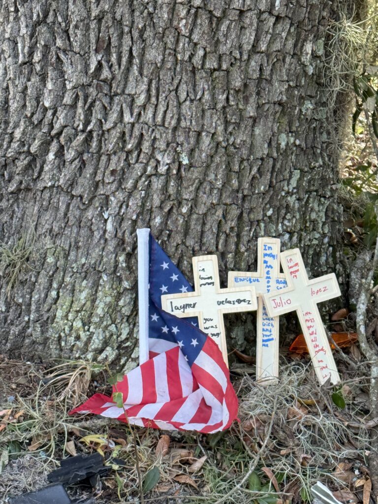 Crosses memorialized the three teenagers killed in the accident: Leyner Velasquez, Enrique Rodriguez Sabas and Julio Lopez.