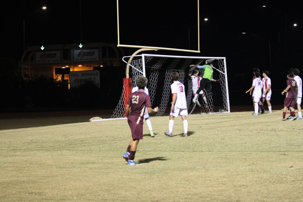 David Bohdert watches his perfect free kick bend past the keeper