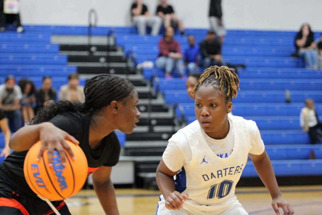 Deriyon Brinson playing tight defense against Morgan Campbell