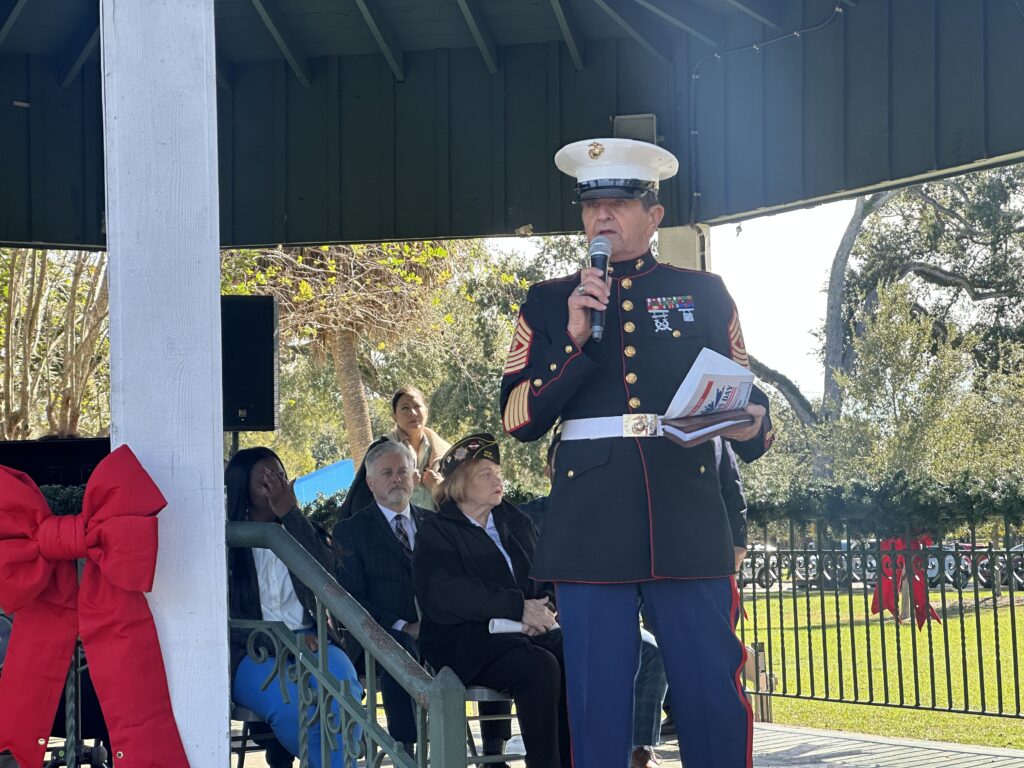 Wearing his blue dress uniform, Pastor David Schorejs of First Baptist Church of Apopka calls for unity of a divided nation on Veterans Day.