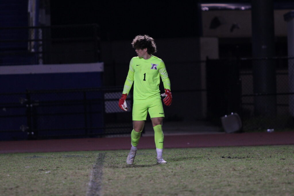 Tanner Stewart getting back to the net after the goalie kick