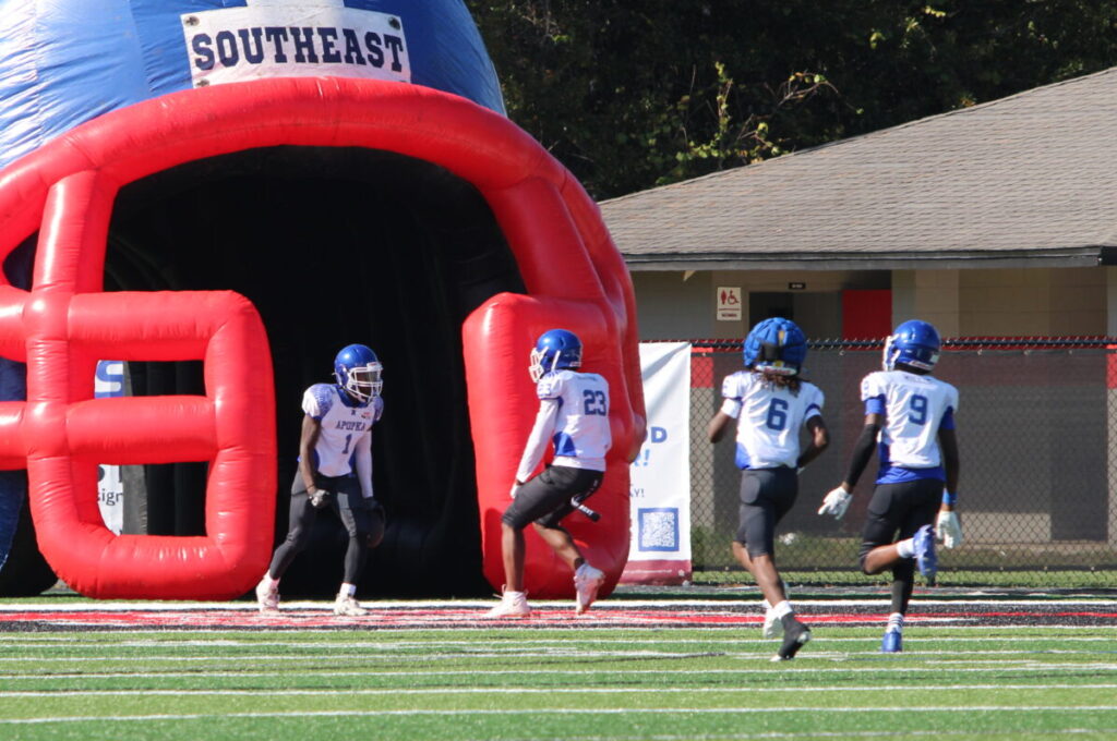 Teammates meet Cayden Dixon in the endzone after his kick return TD