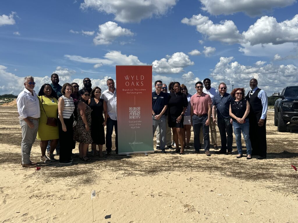 Professionals, entrepreneurs and community leaders finish touring the Wyld Oaks construction site in August for a Chamber event.