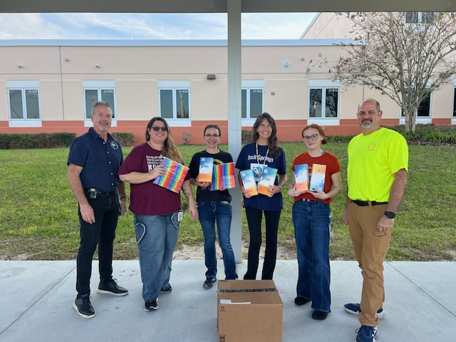 Members of Orange Lodge No. 36 and IGAD, Inc. stand with teachers from Rock Springs Elementary after delivering sensory-support devices to five students identified as needing additional help. The donation is part of IGAD’s mission to support autistic children and families across central Florida.