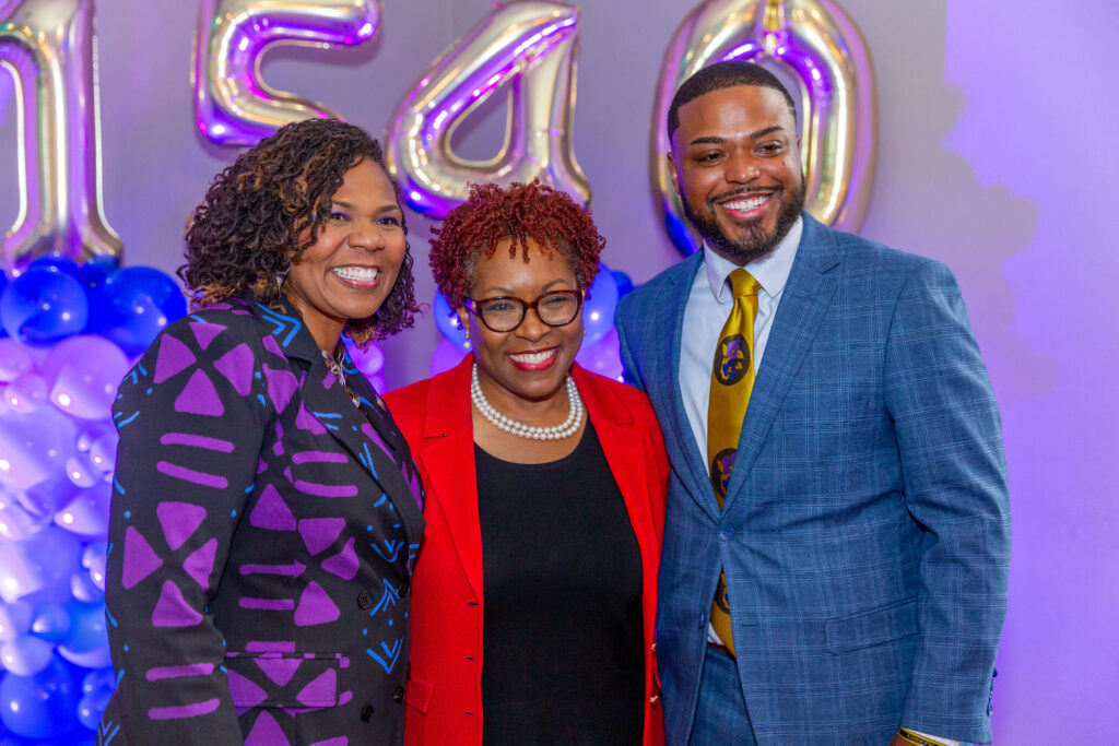LaVon Bracy Davis and RaShon Young celebrate their election with Tiffany Moore Russell on Sept. 2.