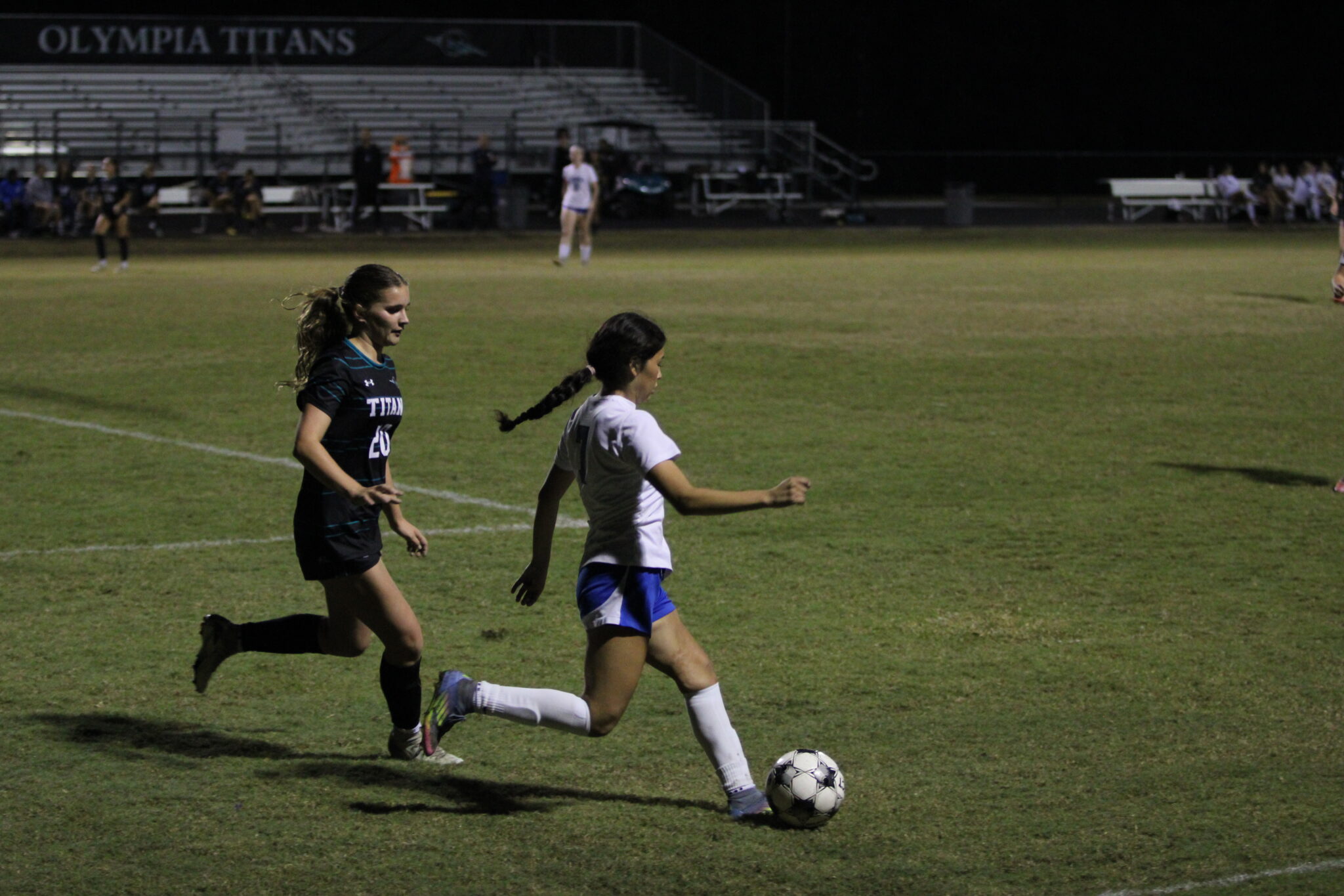 Ariana Obregon makes a pass from right outside the box