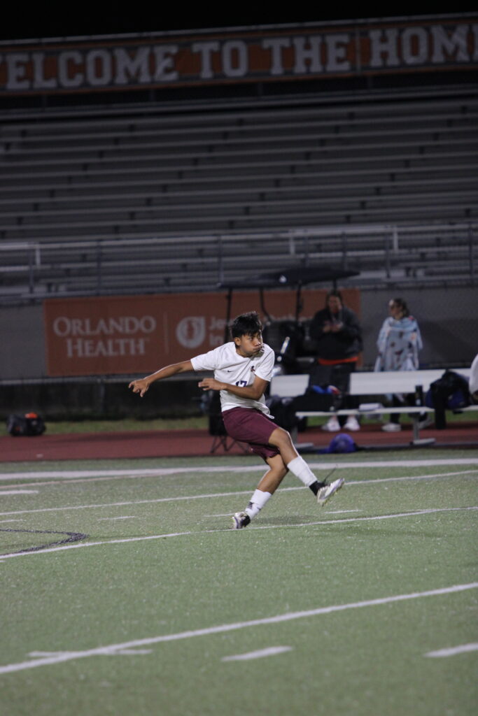 Billy Pu Lopez smokes a long free kick into Boone's box