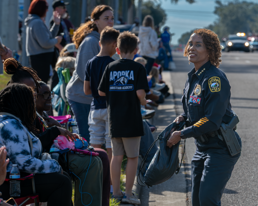 Chief Lovetta Quinn-Henry shares a smile at the Apopka Christmas Parade.