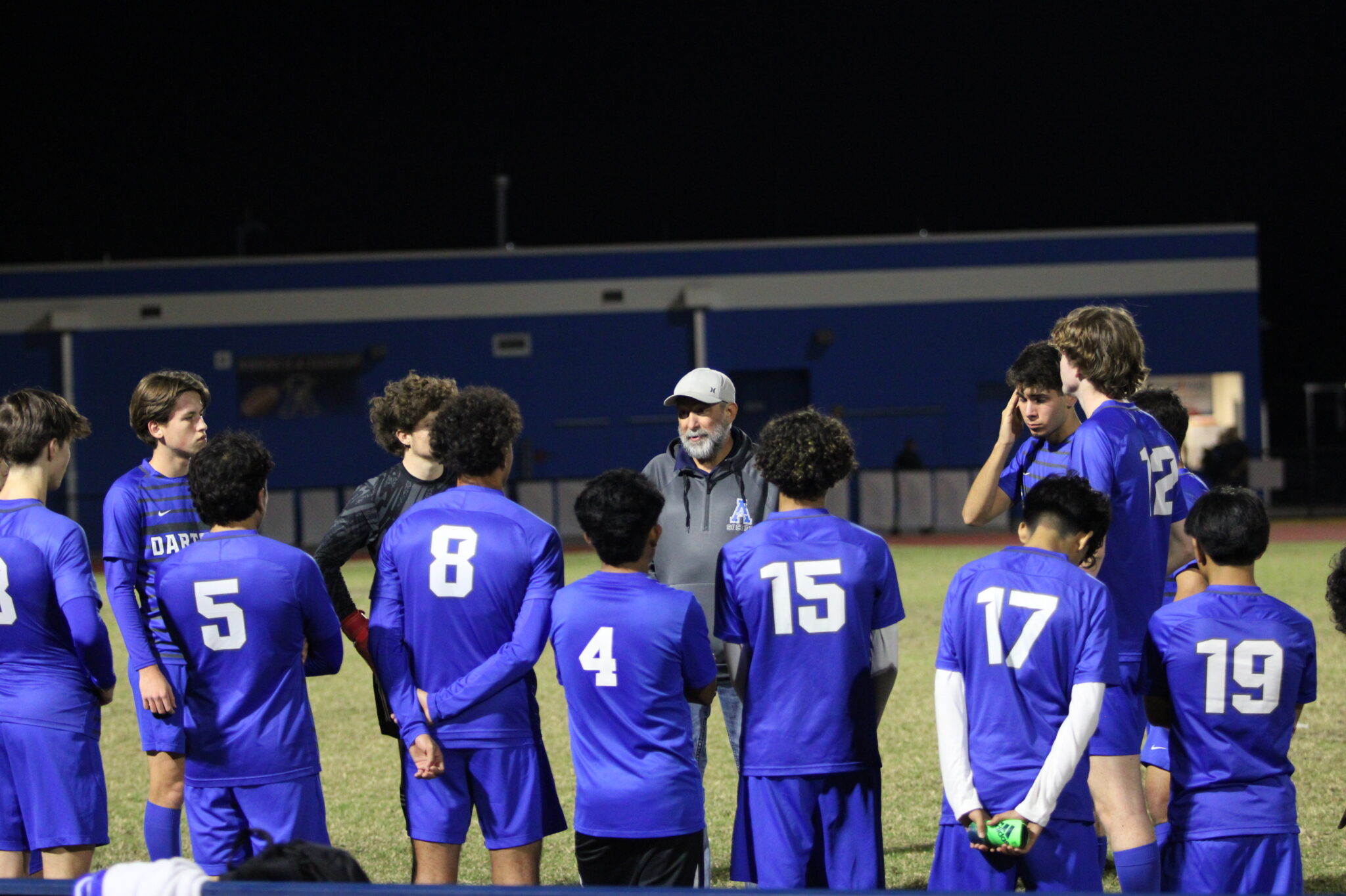 Coach Billy Willier gets the boys regrouped for the second half