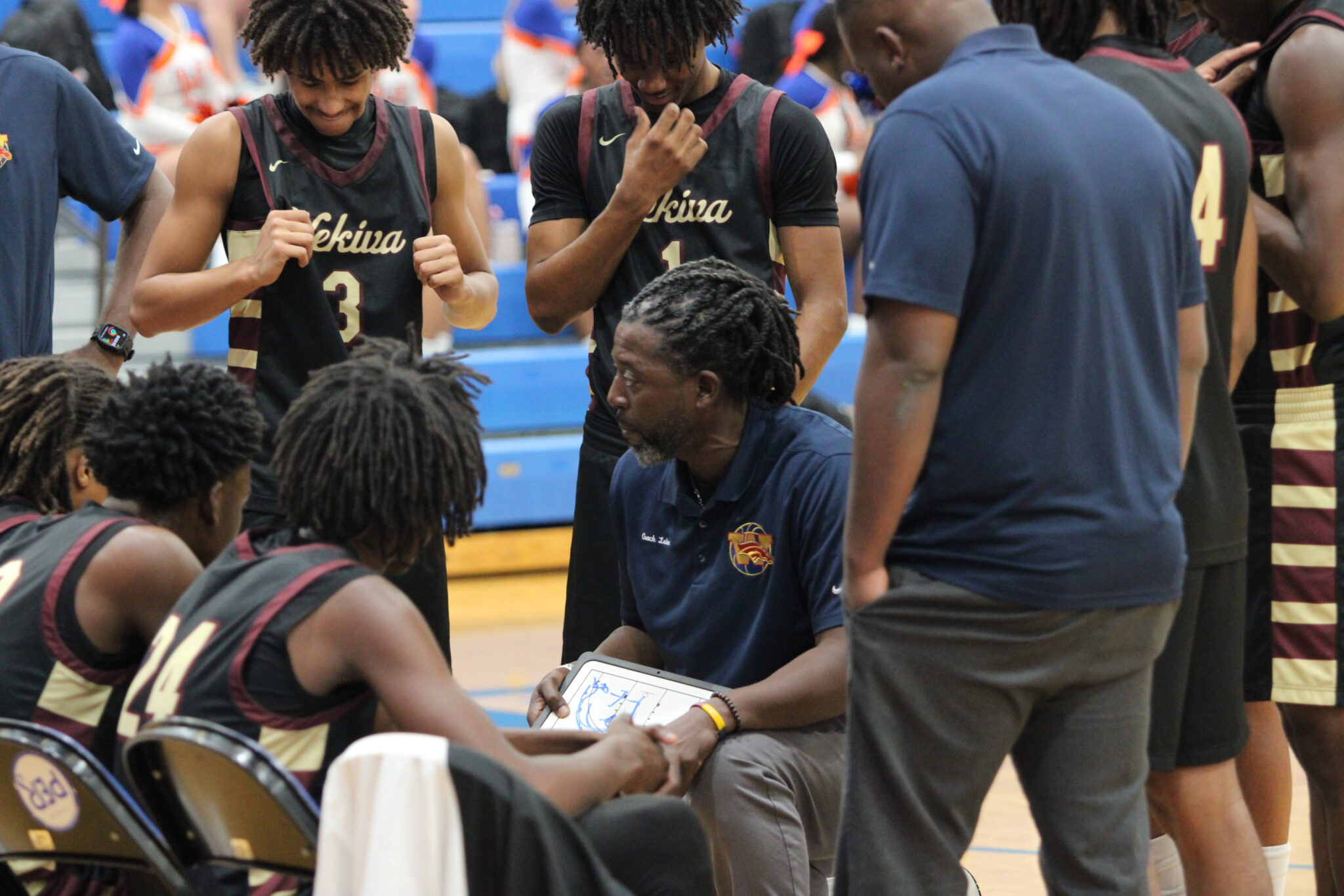 Coach Lubin draws up a play at the timeout