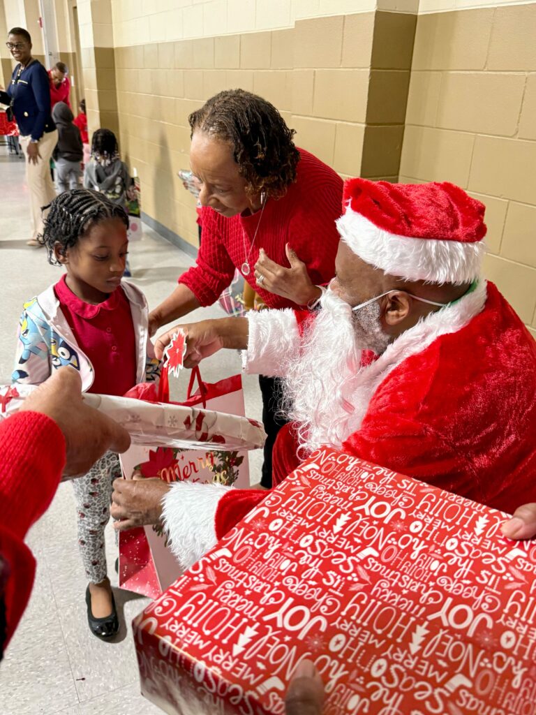 David Rucker—better known as Santa Claus—delivers Christmas cheer.