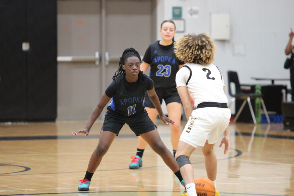 Destiny Gelin playing defense at mid court