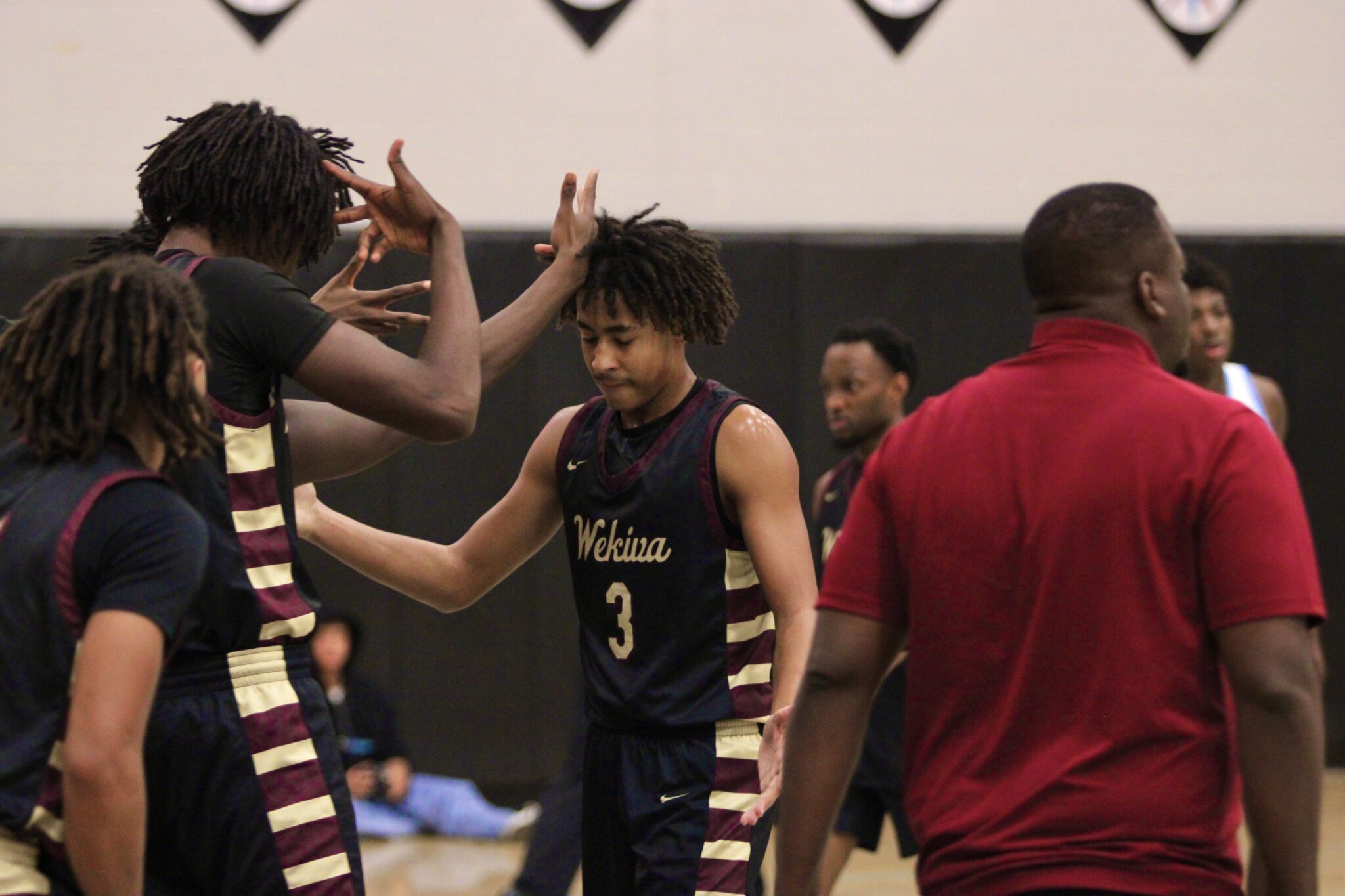 Eric Nichols drains the three at the third quarter buzzer