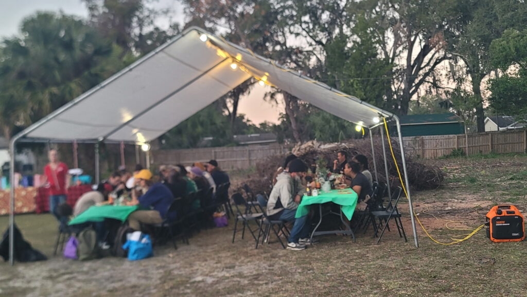 People enjoy their meals at a special Christmas celebration on Sunday, which HOPE of Apopka organized.