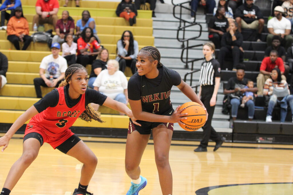 Ja'Niya Poole looks for an open Mustang