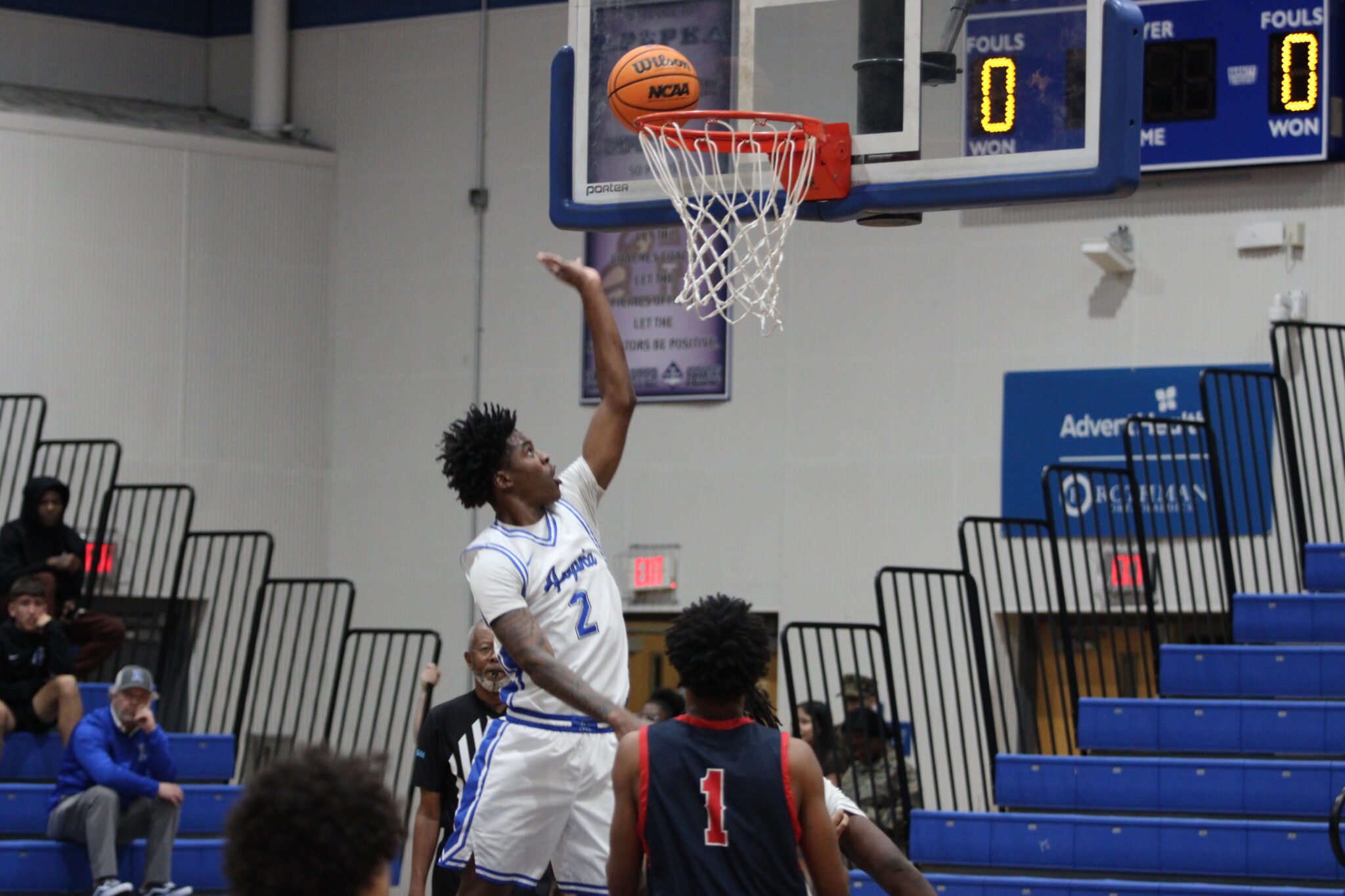 Jarquavion McClain rises for an easy layup