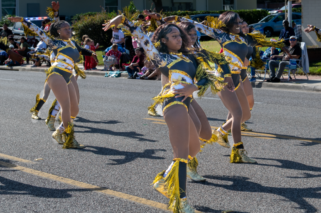 The Dancing Lady Cats perform at the parade.