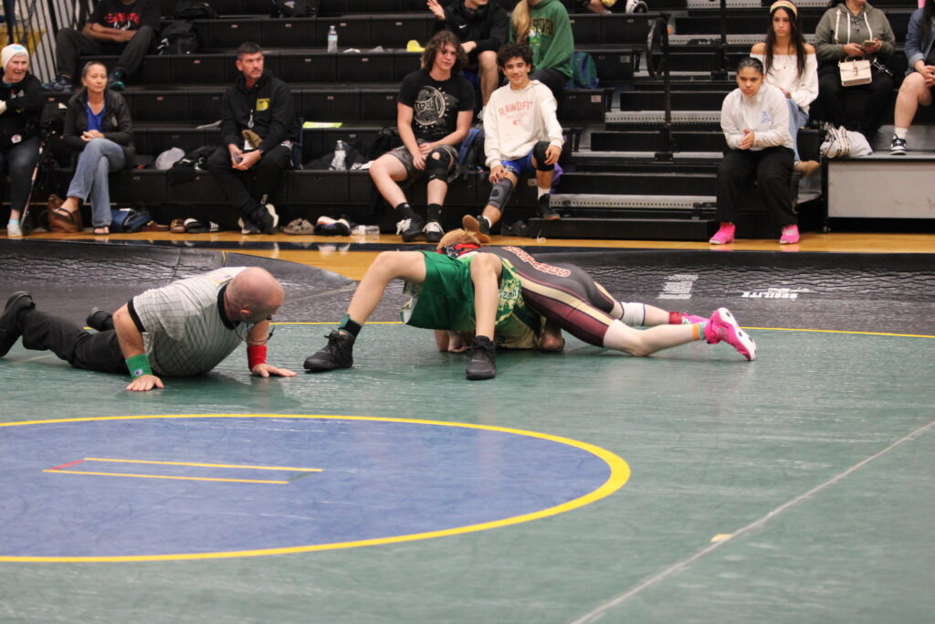 Landonn Shultz plants a pioneer for the pin