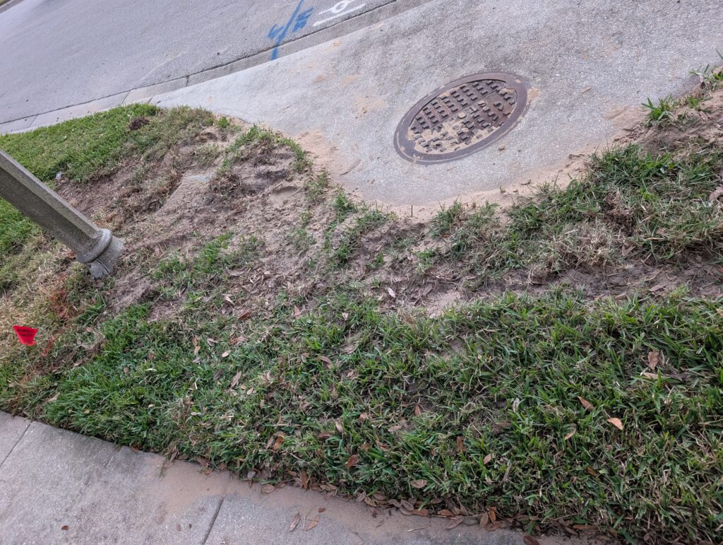 Patches of dirt were left behind after Metronet contractors finished installation.