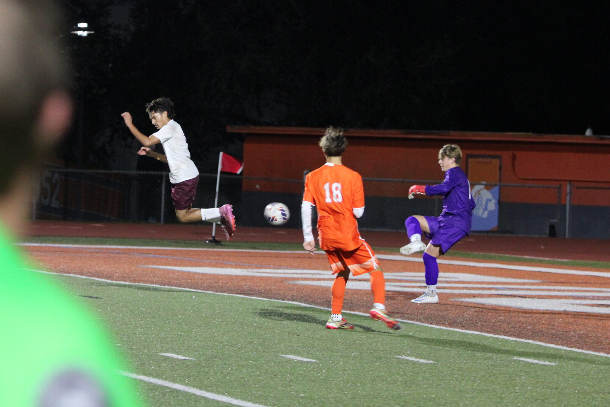 Ricardo Garcia rushes and deflects the goalies kick into the net