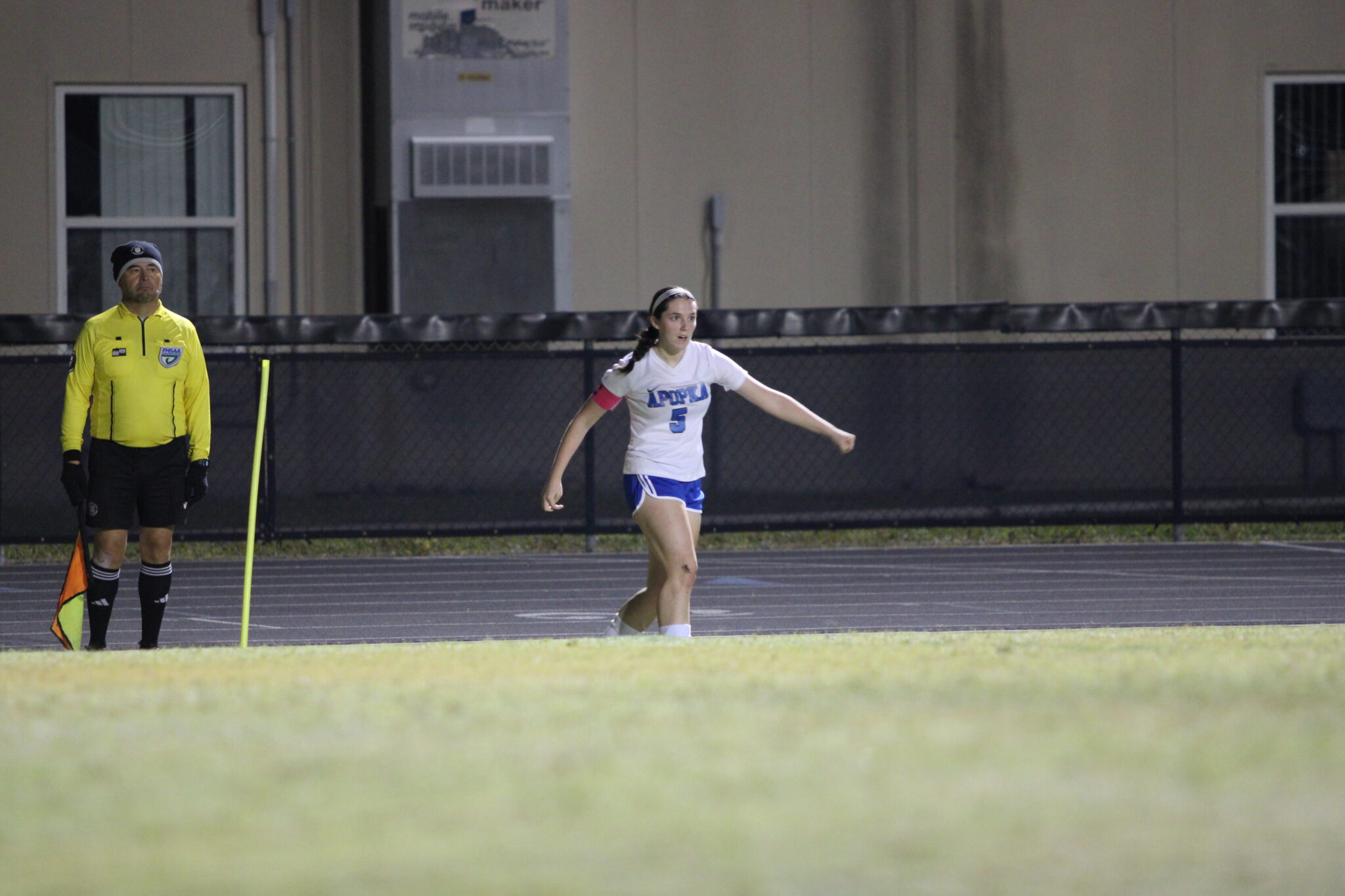 Robyn Pickard boots the corner kick into the box