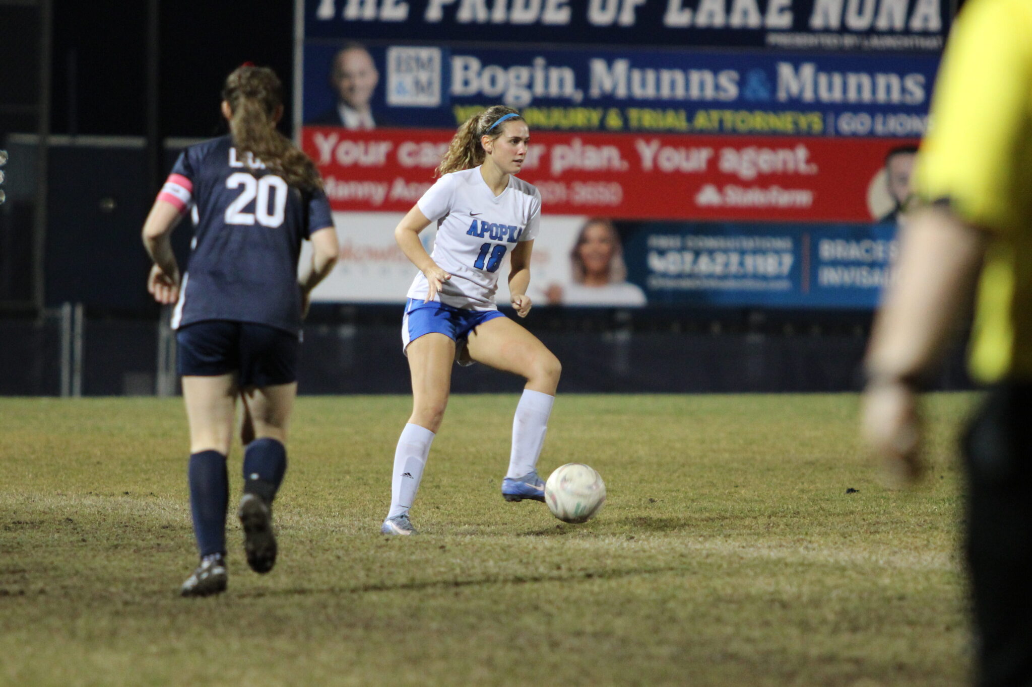 Sydney Chandler looks to make a pass up field