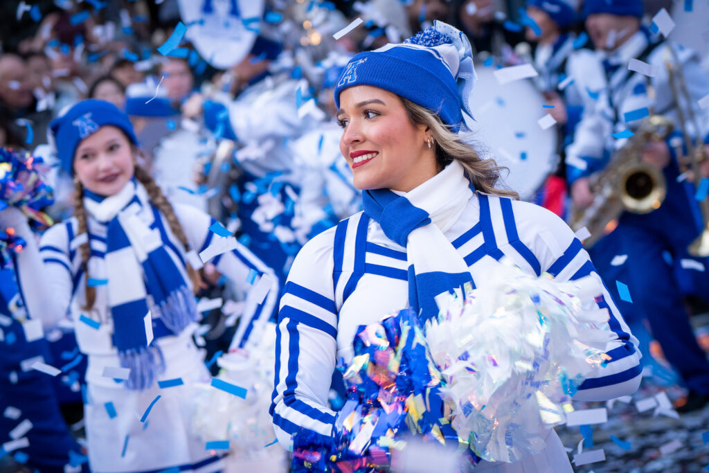An Apopka High School cheerleader smiles as she performs in the London New Year's Day Parade.