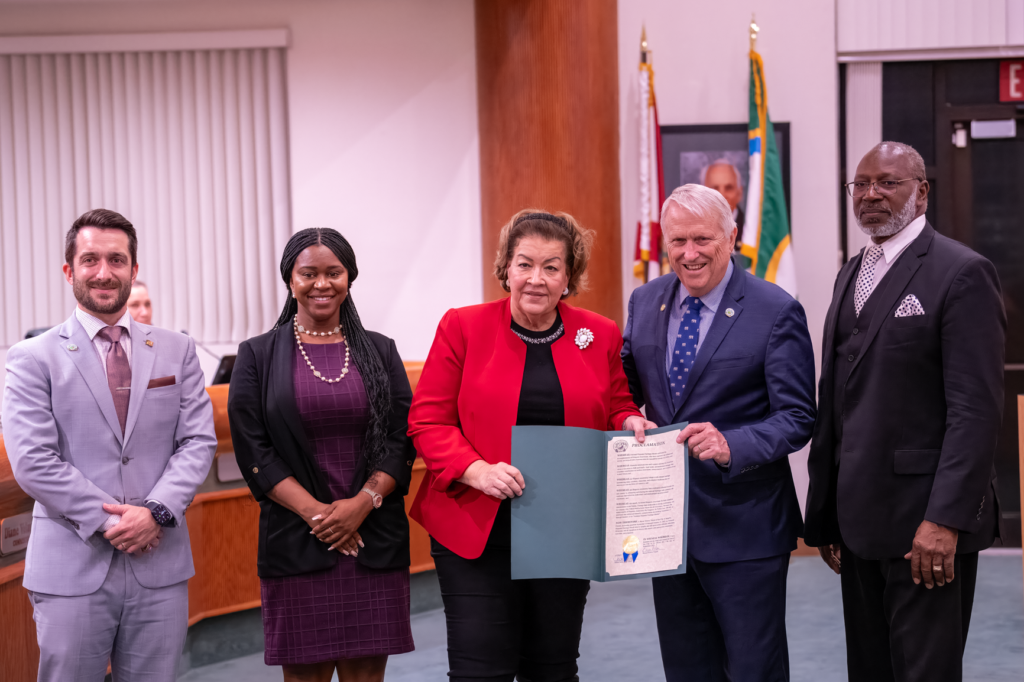 The Apopka City Council displays a proclamation at a September 2025 meeting.