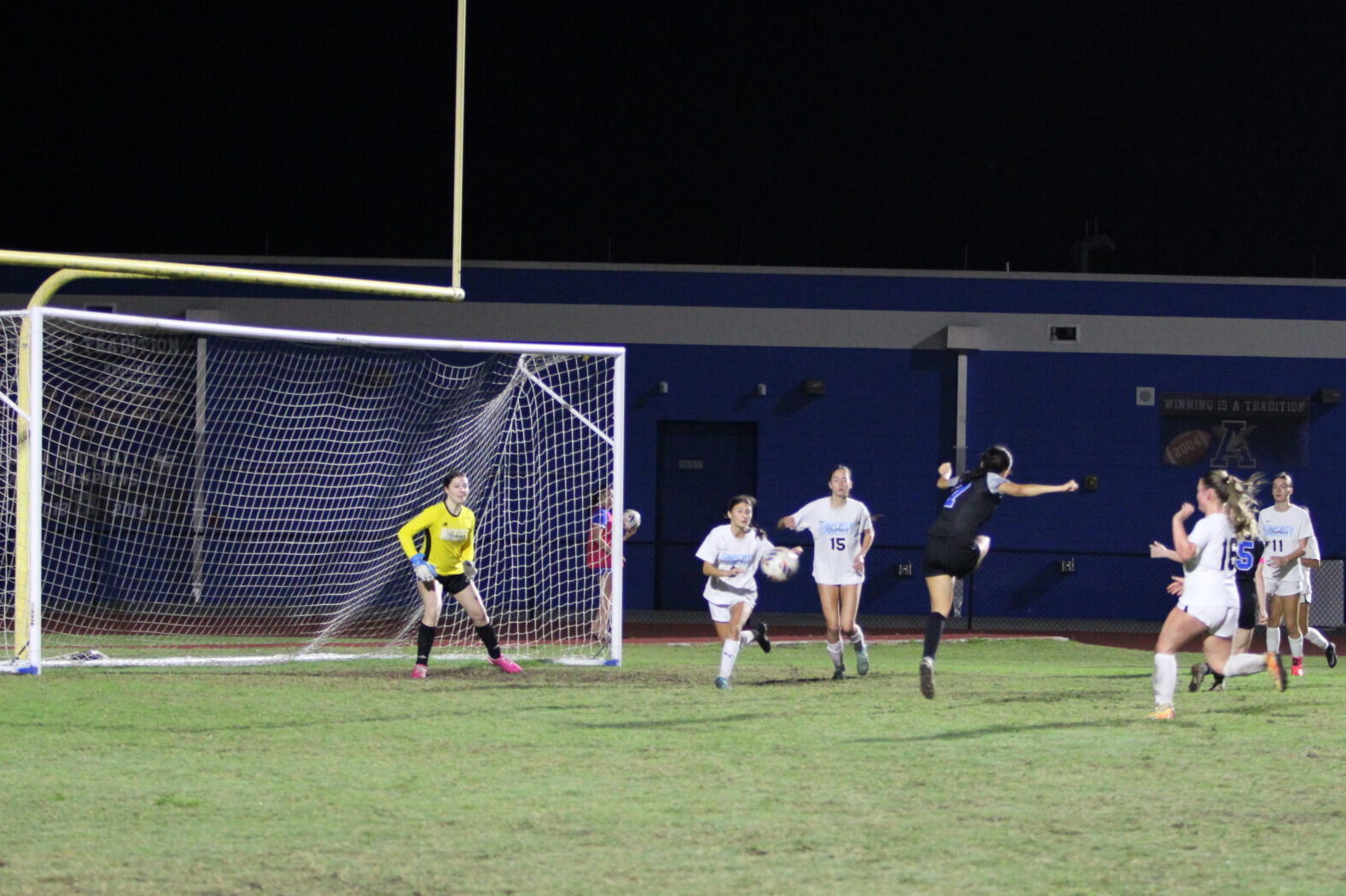 Ariana Obregon strikes a goal off the low cross