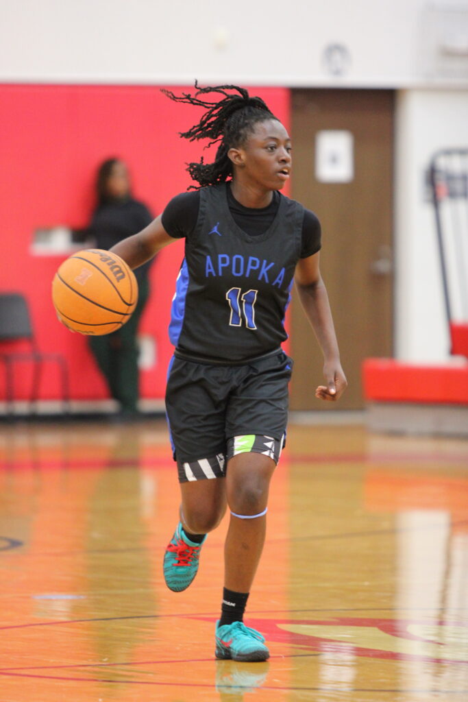 Destiny Gelin taking the ball up the court