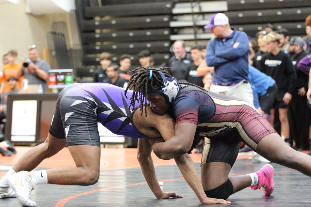 Elijah Jean muscling down his first opponent