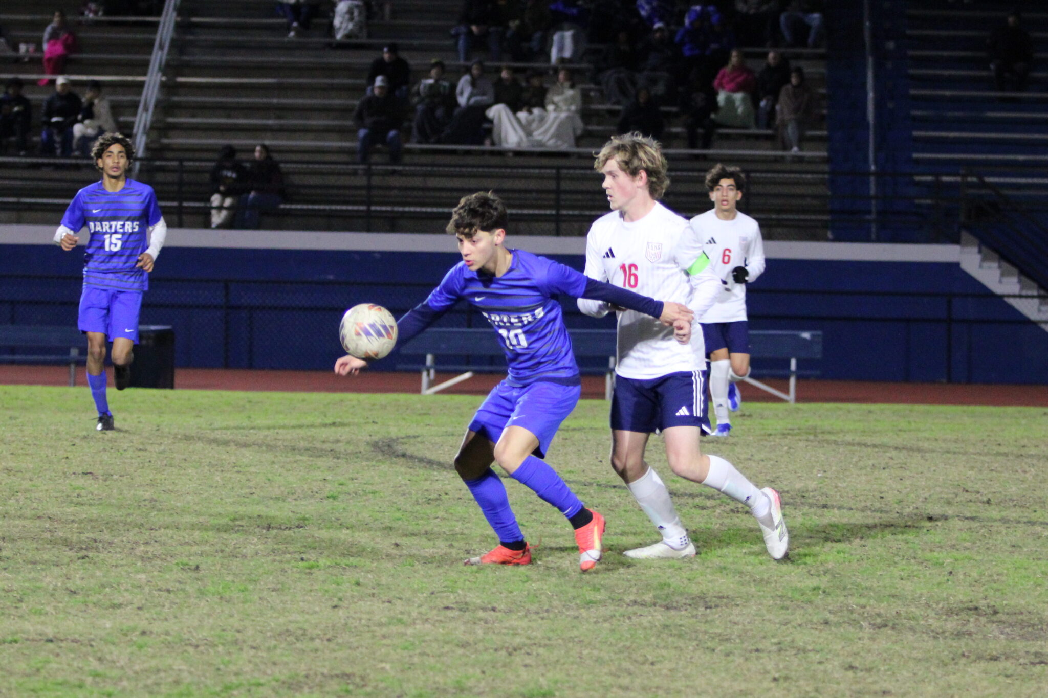 Estevao Amarai shields off a Patriot for possession
