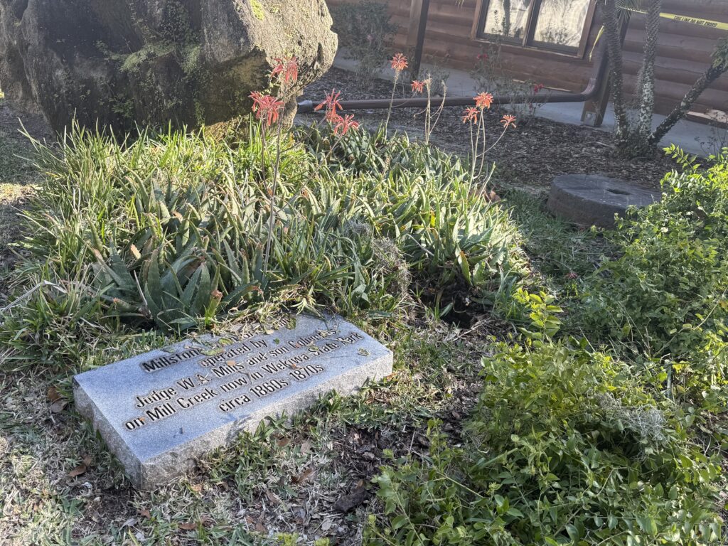 Francina Boykin credits the millstone in front of the building for preventing major damage to the museum.