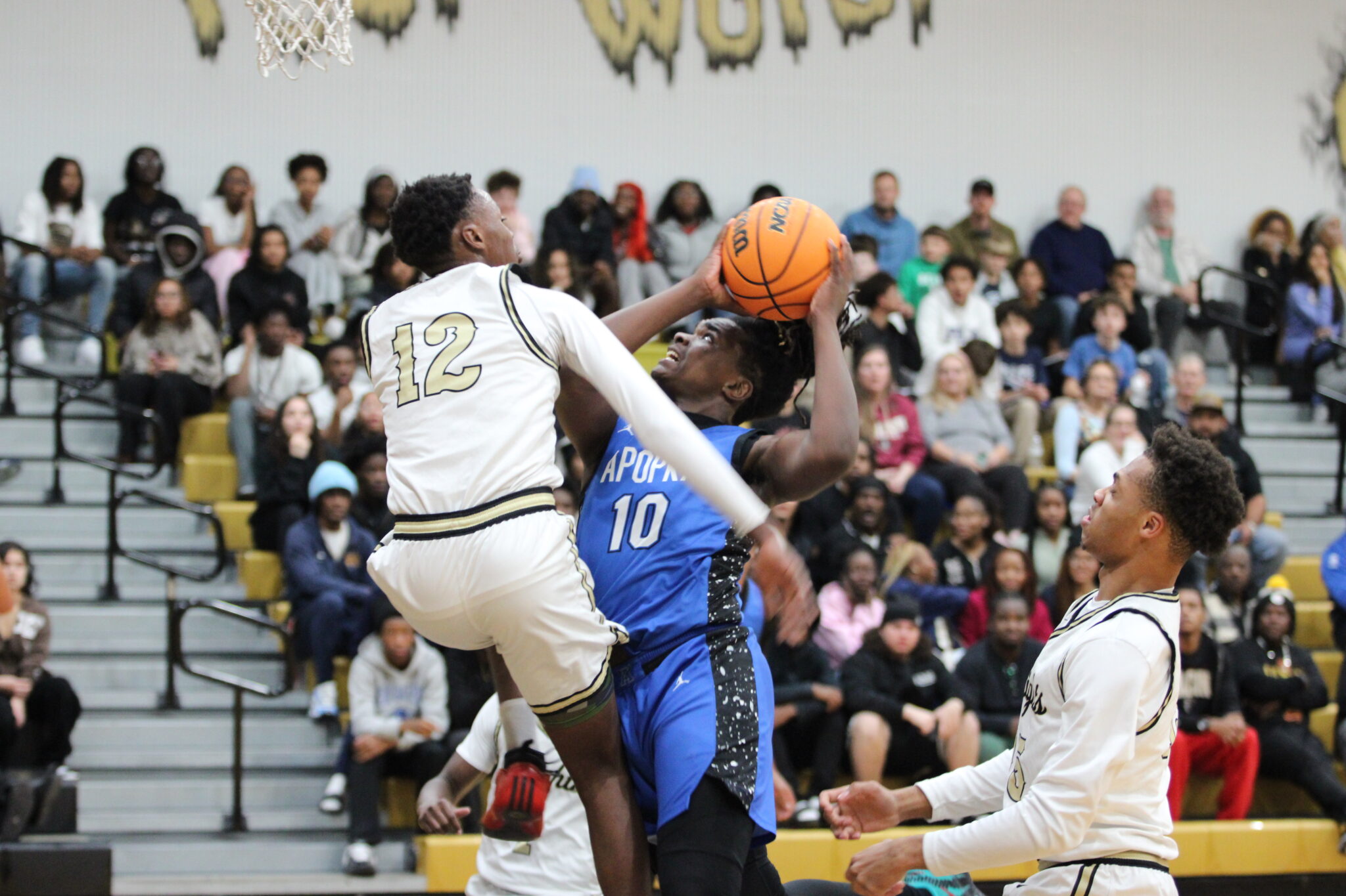 Jacques Evariste fouled on his layup attempt
