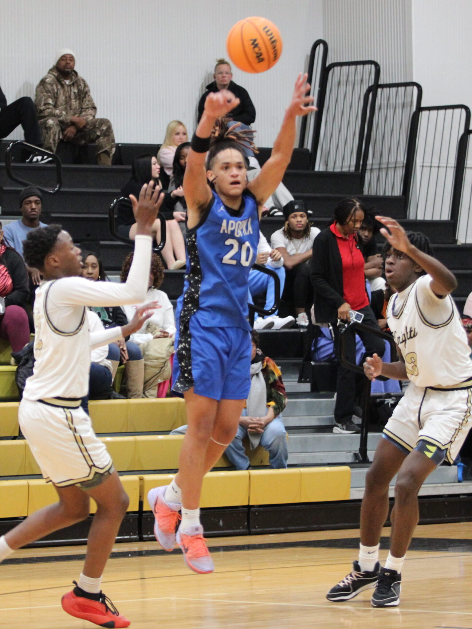 Jaden Andino throws a pass to the right wing