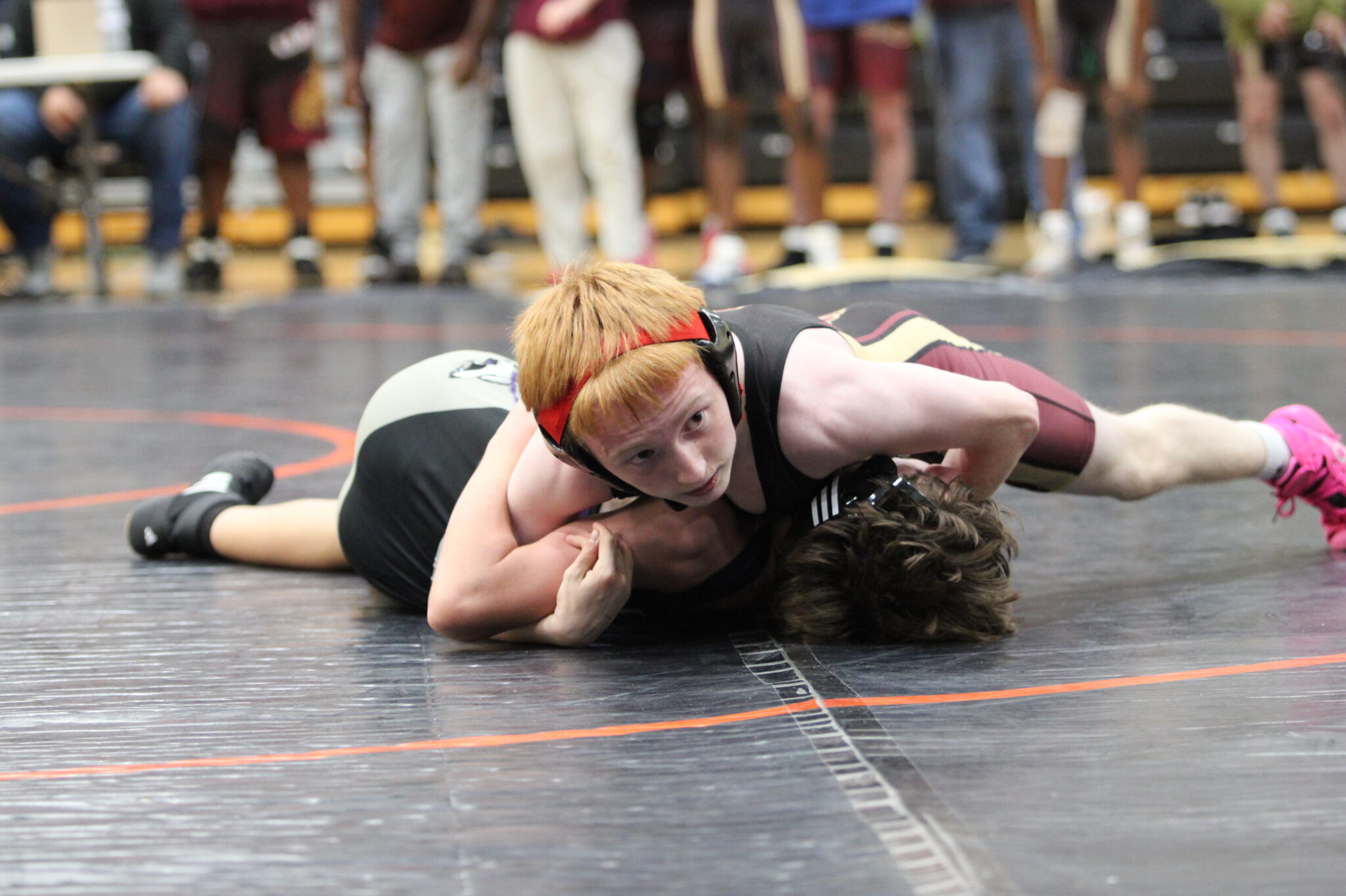 Landonn Shultz holds the Timber Creek wolf down for the pin
