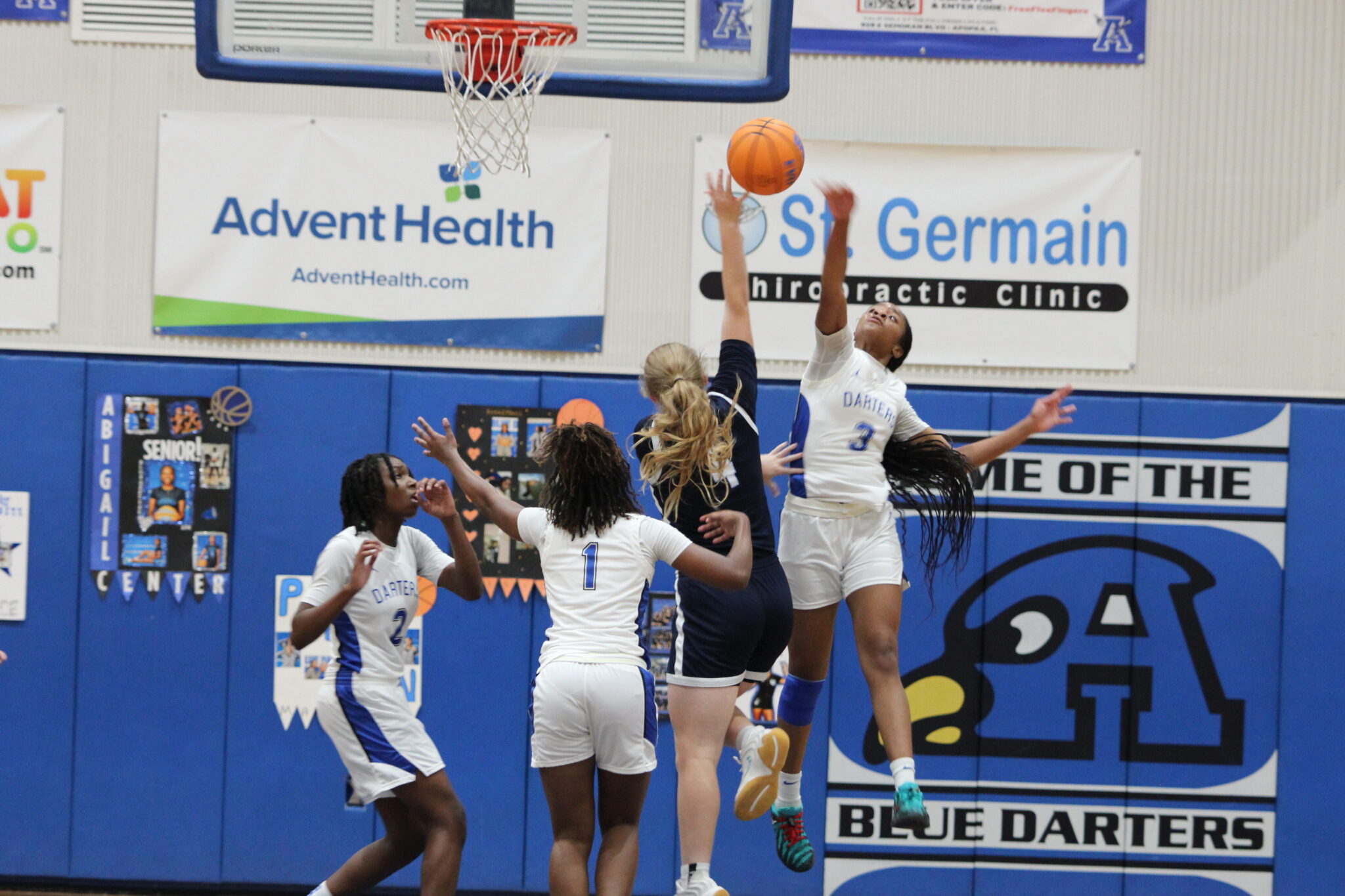 Mikayla Wiggins rises up with a Panther to swat the floater
