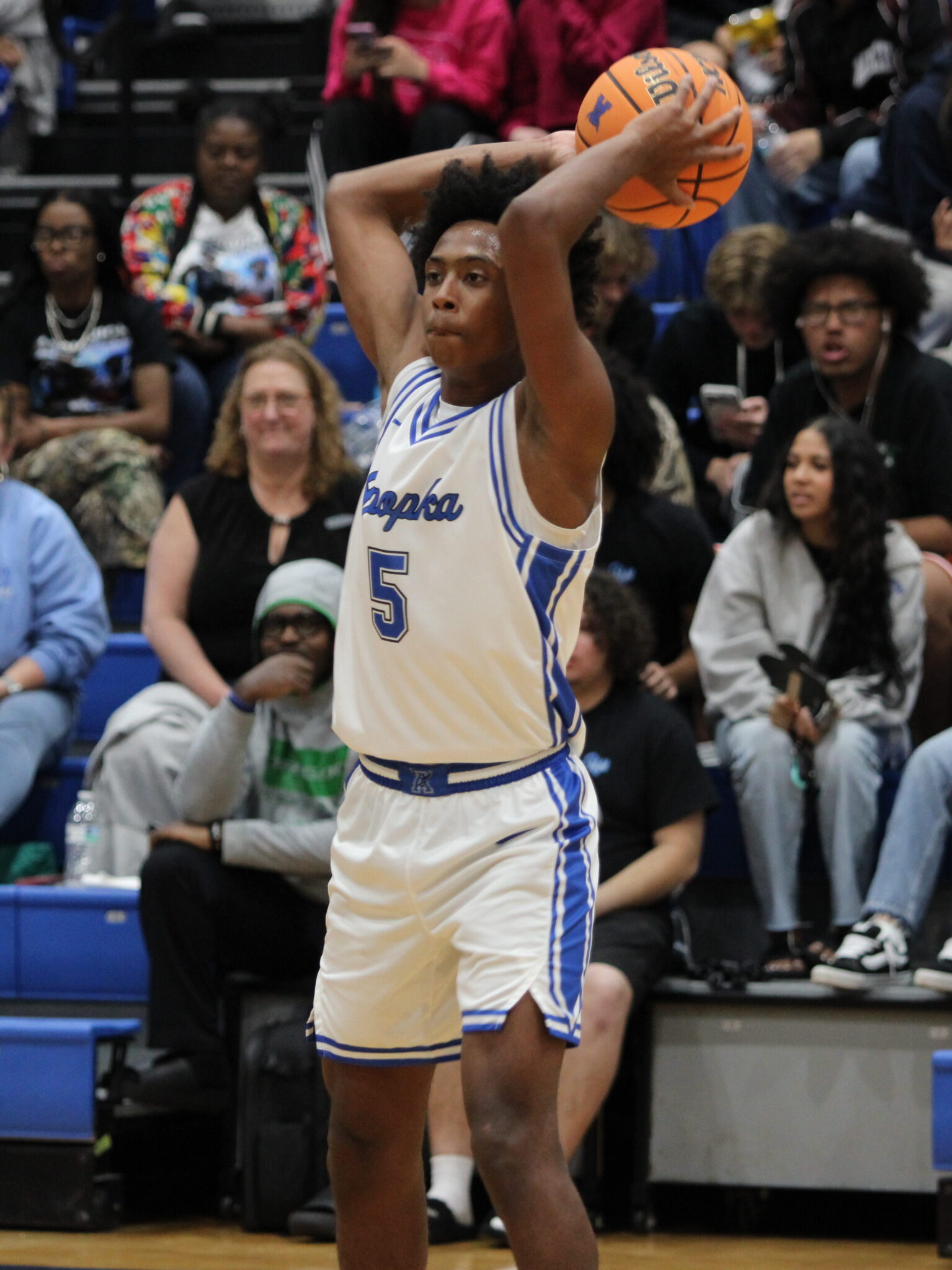 Noah Ferrer looks to pass toward the opposite wing