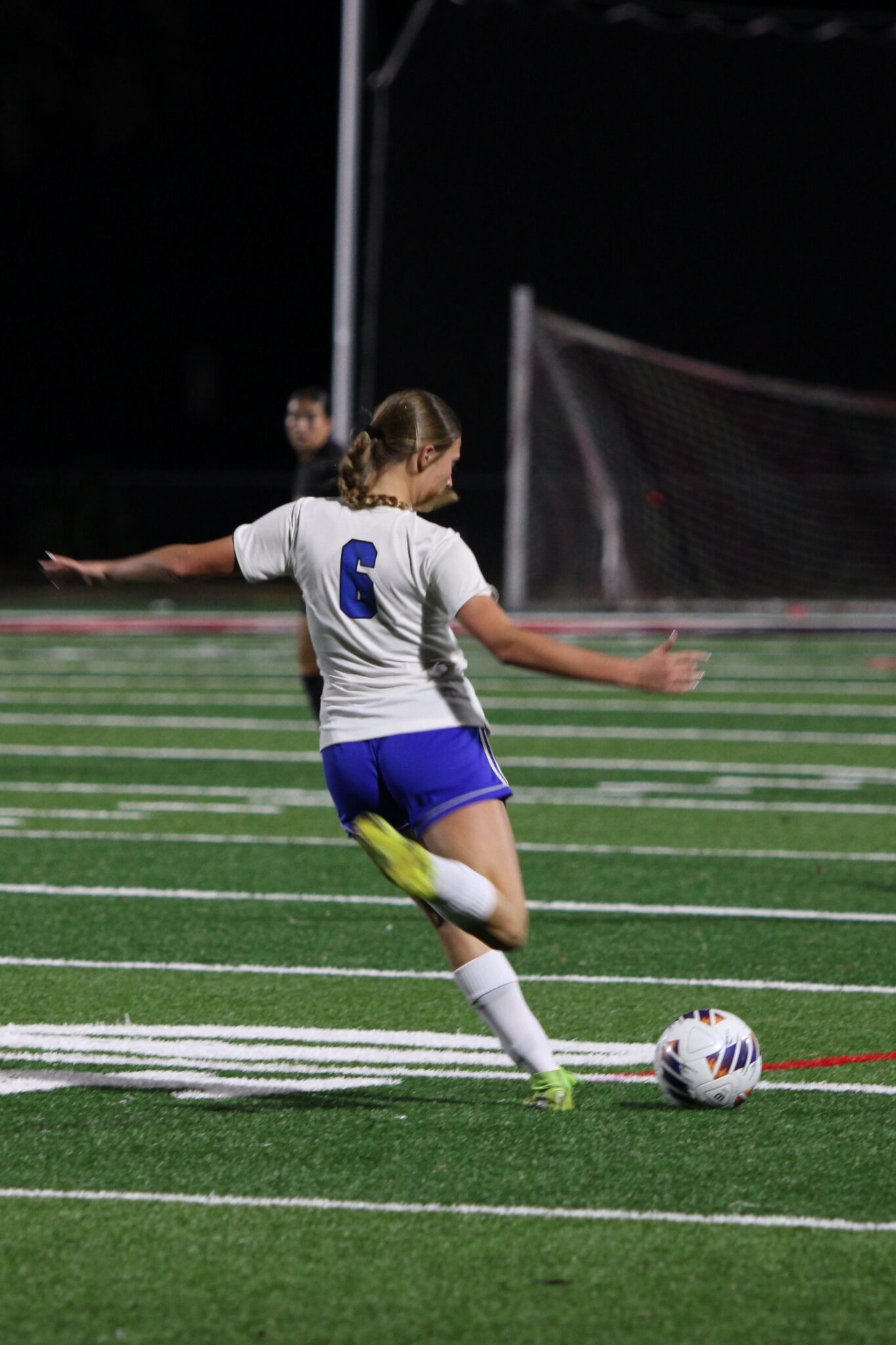 Pressley Perrone looks to send a through ball to Jillian Kurz