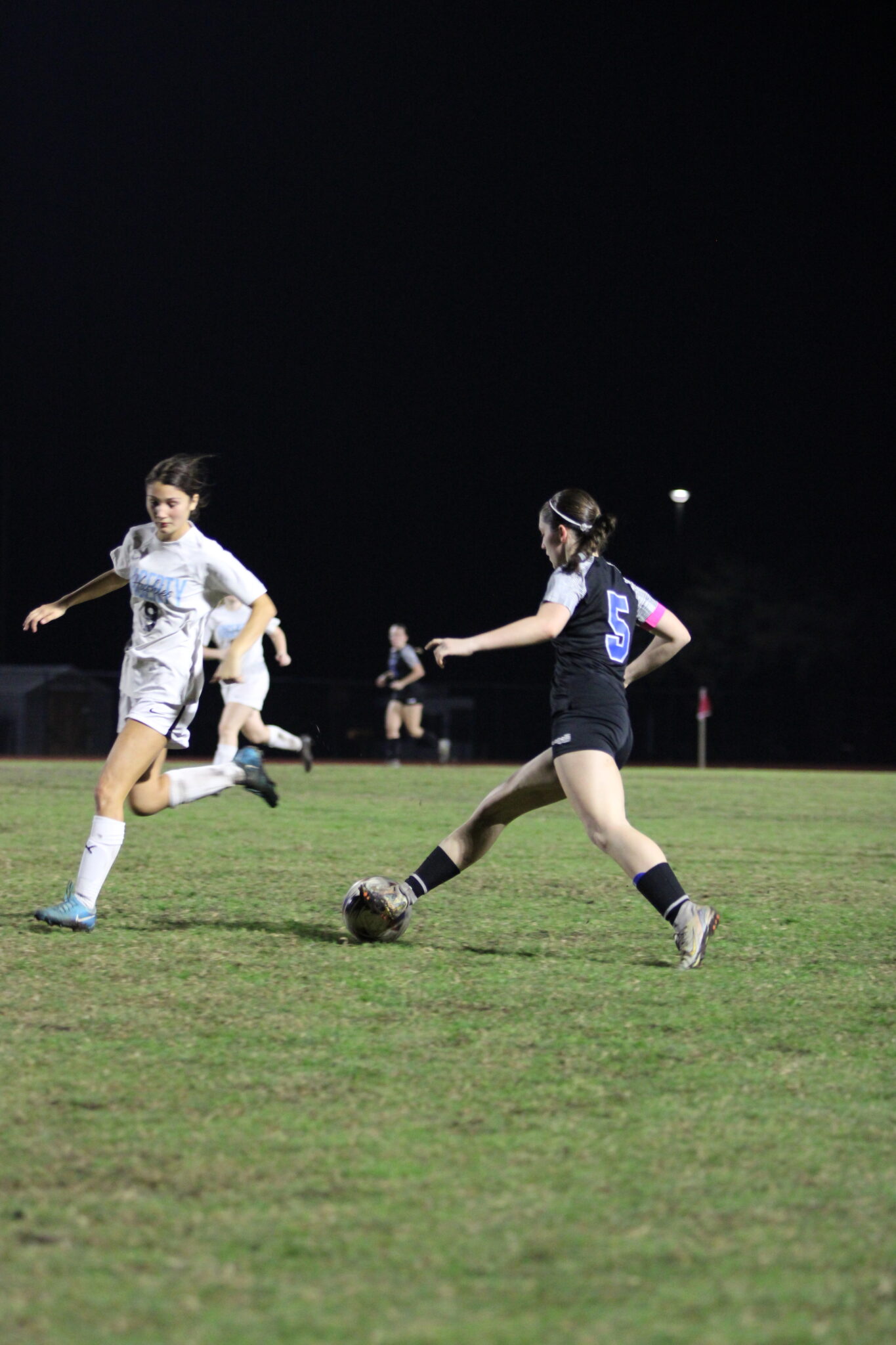 Robyn Pickard makes a move past the defender