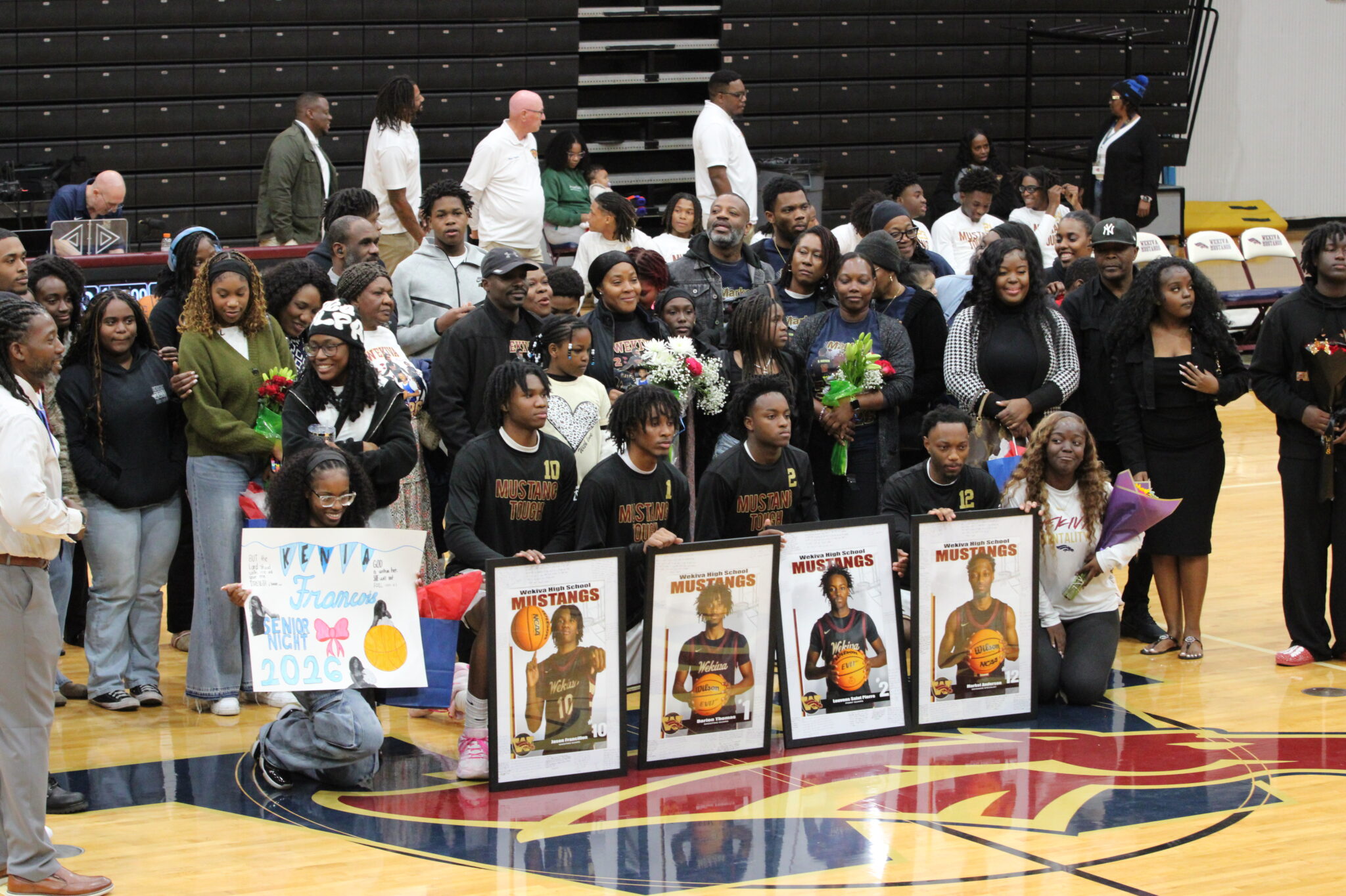 Wekiva Mustangs 2026 Senior night family group photo