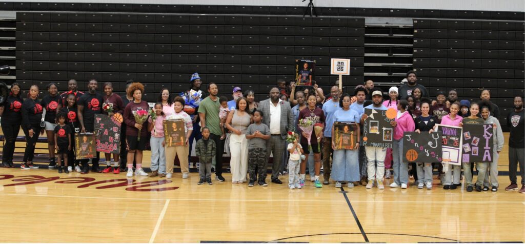 Wekiva girls Senior Night family group photo