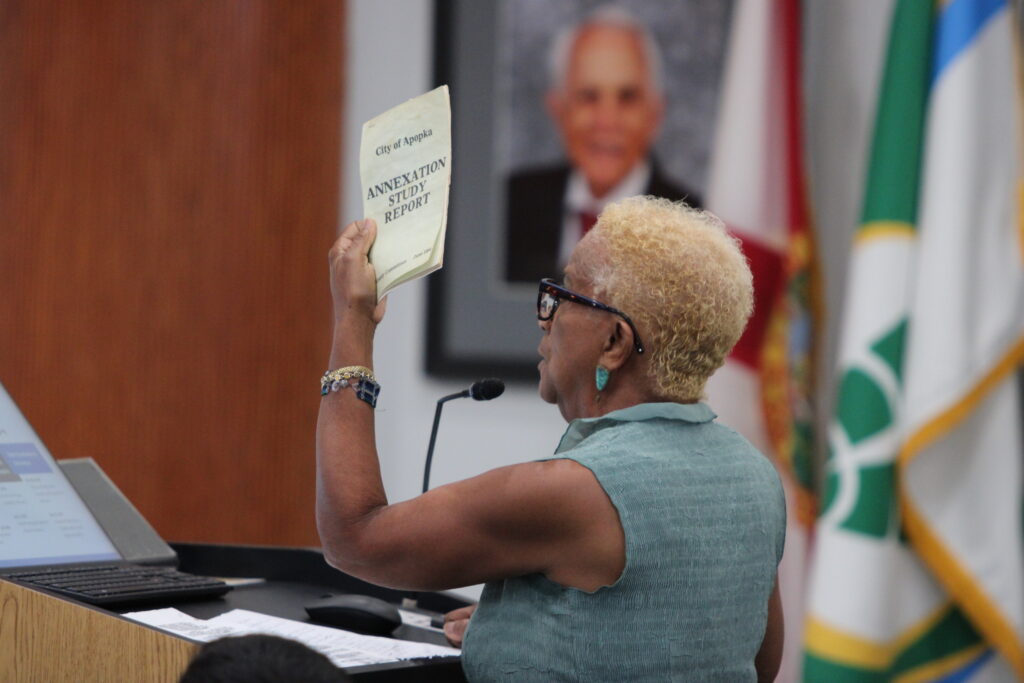 Francina Boykin speaks at a City Council meeting.