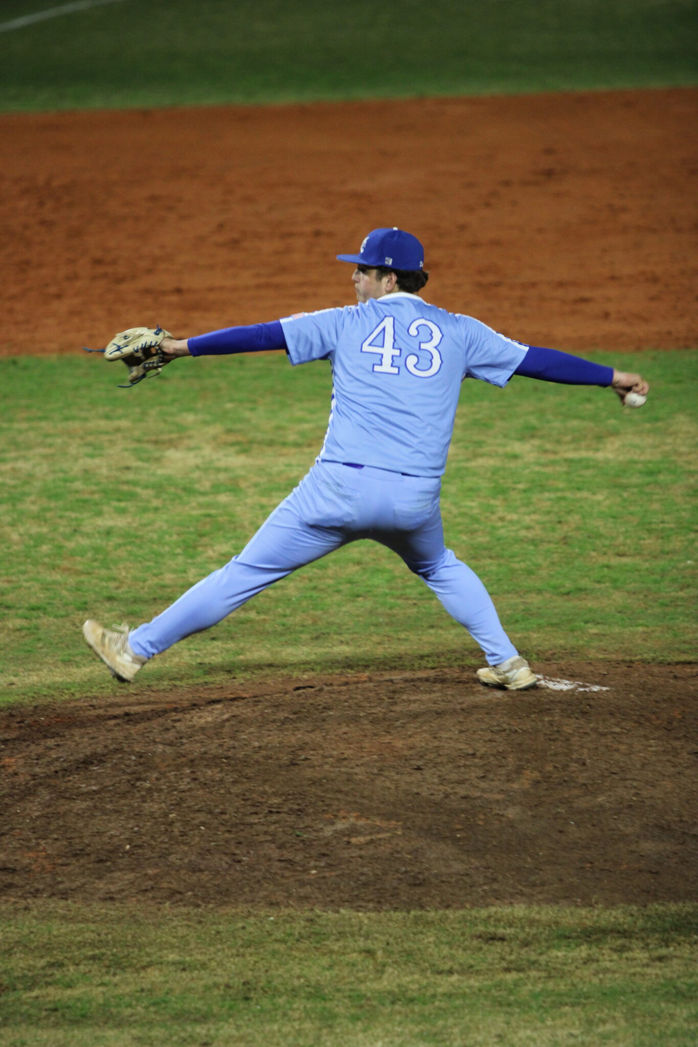 Anthony Raymond winds up a pitch against the final batter