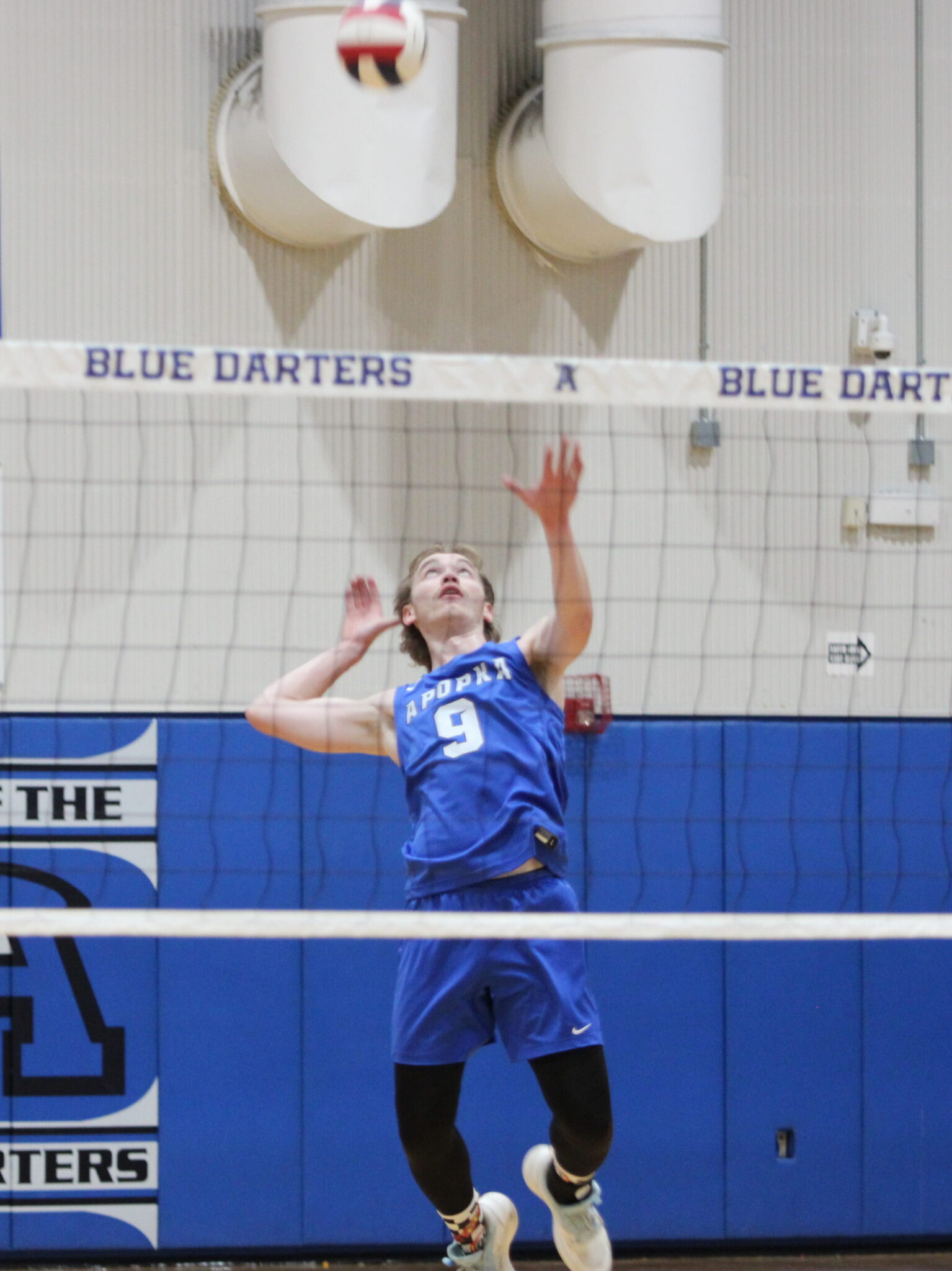 Caden McGatha rises up for a kill against West Orange