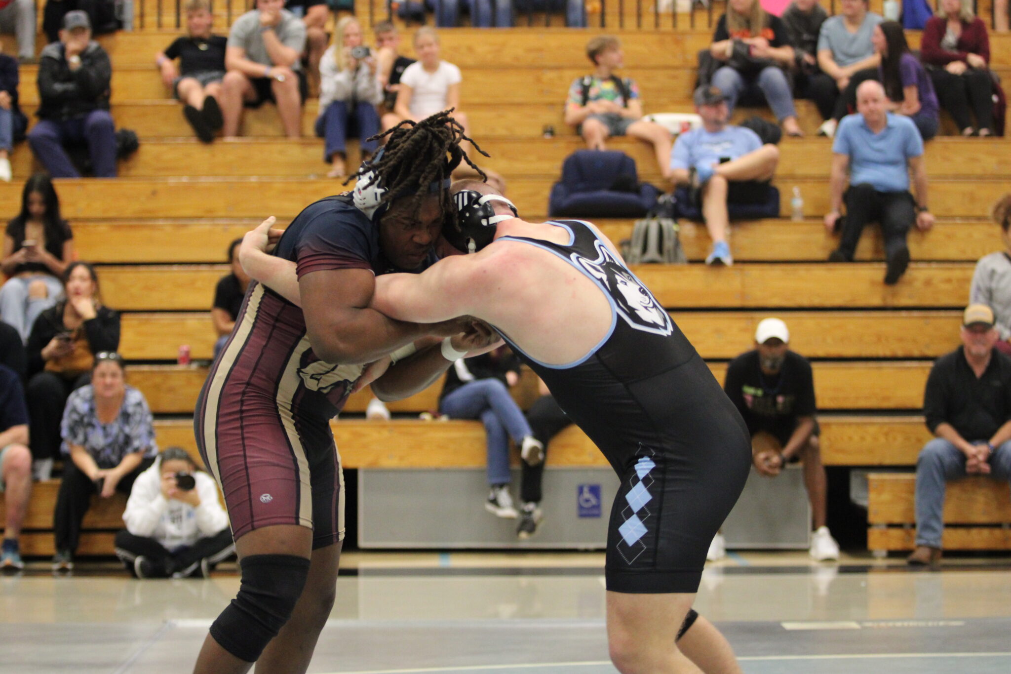 Elijah Jean and top rank wrestler from Hagerty square off in District Championship